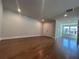 Large bonus room featuring hardwood floors, recessed lighting, and ample space at 400 Renwood Trl, Johns Creek, GA 30097
