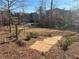 Sign for Embry Park with manicured landscaping and a walking trail at 400 Renwood Trl, Johns Creek, GA 30097