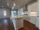 Kitchen with quartz counters, stainless appliances and hardwood flooring at 400 Renwood Trl, Johns Creek, GA 30097