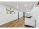 Large basement area with light wood floors, white walls, and recessed lighting, ideal for creating a multi-functional space at 5901 Miller Rd, Austell, GA 30106