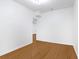 Bright bedroom features neutral walls and hardwood floors at 5901 Miller Rd, Austell, GA 30106