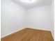 Bright bedroom features neutral walls and hardwood floors at 5901 Miller Rd, Austell, GA 30106