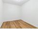 Bright bedroom features neutral walls and hardwood floors at 5901 Miller Rd, Austell, GA 30106