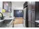 Kitchen and dining area featuring stainless steel appliances, modern fixtures, and open layout at 5901 Miller Rd, Austell, GA 30106