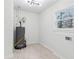 Laundry room with a water heater and window for natural light at 5901 Miller Rd, Austell, GA 30106
