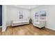 Bright and airy living space with hardwood floors and white sofa set at 5901 Miller Rd, Austell, GA 30106