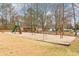 Community playground with slide and swings offers outdoor fun for residents at 5901 Miller Rd, Austell, GA 30106