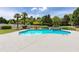 Inviting backyard pool with waterfall feature, lounge chairs, and lush landscaping at 820 Nob Ridge Dr, Marietta, GA 30064