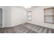 Empty bedroom featuring neutral walls, wood blinds, and gray carpeting at 820 Nob Ridge Dr, Marietta, GA 30064
