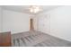 Spacious bedroom featuring neutral walls, a ceiling fan, and double door closet at 820 Nob Ridge Dr, Marietta, GA 30064