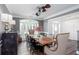Elegant dining room with hardwood floors, large windows, and stylish furnishings for sophisticated meals at 820 Nob Ridge Dr, Marietta, GA 30064