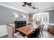 Elegant dining room with hardwood floors, large windows, and stylish furnishings for sophisticated meals at 820 Nob Ridge Dr, Marietta, GA 30064