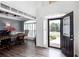 Welcoming foyer with hardwood floors, high ceilings, and views into the dining area at 820 Nob Ridge Dr, Marietta, GA 30064