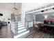 Inviting foyer featuring a staircase with decorative iron railings and an open floor plan with wood floors at 820 Nob Ridge Dr, Marietta, GA 30064
