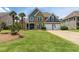Charming two-story home with stone and siding, manicured lawn, and a two-car garage at 820 Nob Ridge Dr, Marietta, GA 30064