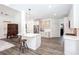 Kitchen area with central island, stainless steel appliances, and hardwood floors at 820 Nob Ridge Dr, Marietta, GA 30064