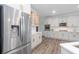Contemporary kitchen with sleek stainless steel appliances and stylish white cabinetry at 820 Nob Ridge Dr, Marietta, GA 30064