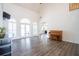 Bright living room with high ceilings, hardwood floors, and plenty of natural light from large windows at 820 Nob Ridge Dr, Marietta, GA 30064