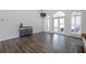 Bright and airy living room featuring wood floors, french doors, and backyard views at 820 Nob Ridge Dr, Marietta, GA 30064