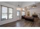 Bright and airy living area with hardwood floors and access to the exterior pool and patio area at 820 Nob Ridge Dr, Marietta, GA 30064