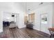 Open living space with hardwood floors, recessed lighting, and door to backyard pool at 820 Nob Ridge Dr, Marietta, GA 30064
