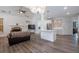 Bright and spacious living area flowing into the kitchen with hardwood floors and neutral decor at 820 Nob Ridge Dr, Marietta, GA 30064