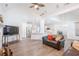 Open living room showcases a seamless transition to the kitchen with vaulted ceilings and hardwood floors at 820 Nob Ridge Dr, Marietta, GA 30064