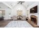 Bright, open living room with stone fireplace, vaulted ceilings and hardwood floors at 820 Nob Ridge Dr, Marietta, GA 30064