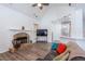 Inviting living room with stone fireplace, vaulted ceilings, and an open layout to kitchen at 820 Nob Ridge Dr, Marietta, GA 30064