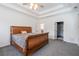 Main bedroom featuring neutral walls, carpet, ceiling fan and access to a bathroom at 820 Nob Ridge Dr, Marietta, GA 30064