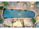 Aerial view of a community pond with fountain, surrounded by trees and landscaping, providing a serene environment at 820 Nob Ridge Dr, Marietta, GA 30064