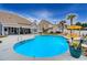 Backyard with a pool and patio, complete with lounge chairs and lush landscaping at 820 Nob Ridge Dr, Marietta, GA 30064