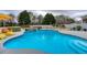 Outdoor pool and spa with landscaped surroundings and a serene backyard setting at 820 Nob Ridge Dr, Marietta, GA 30064