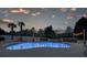Gorgeous backyard pool with patio, landscaping and outdoor lighting at dusk at 820 Nob Ridge Dr, Marietta, GA 30064