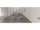 Elegant dining room with wood floors, modern table and chairs, and natural light at 146 Silverton Dr, Dacula, GA 30019