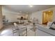 Bright living room open to the kitchen features modern furnishings and a welcoming atmosphere at 146 Silverton Dr, Dacula, GA 30019