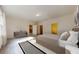 Spacious main bedroom with neutral colors, ensuite bathroom, and plenty of natural light at 146 Silverton Dr, Dacula, GA 30019