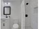 Modern bathroom featuring updated fixtures, a tiled shower, and a clean design for a comfortable space at 1576 Elixir Sw Ave, Atlanta, GA 30314