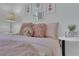 Cozy bedroom with decorative touches, a plush bed, and ambient lighting for a warm atmosphere at 1576 Elixir Sw Ave, Atlanta, GA 30314