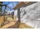 View of a new wood deck, with a door to the house and a view of the backyard at 1576 Elixir Sw Ave, Atlanta, GA 30314