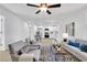 Open living room, bright and airy, flowing into the kitchen, showcasing the home's layout at 1576 Elixir Sw Ave, Atlanta, GA 30314