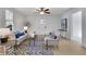 Cozy living room featuring stylish furniture, a decorative rug, and plenty of natural light at 1576 Elixir Sw Ave, Atlanta, GA 30314