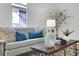 Close up on living room furniture, showing a comfortable couch with a decorative pillow at 1576 Elixir Sw Ave, Atlanta, GA 30314
