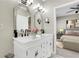 Spacious bathroom with double vanities, decorative mirrors, and modern fixtures at 2400 Cumberland Se Pkwy # 212, Atlanta, GA 30339