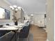 Dining and living area with hardwood floors and neutral color palette at 2400 Cumberland Se Pkwy # 212, Atlanta, GA 30339