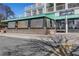 Street-side view of a restaurant featuring an inviting outdoor patio area for brunch and lunch at 2400 Cumberland Se Pkwy # 212, Atlanta, GA 30339