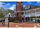 Charming mixed-use commercial building with classic architectural details and a welcoming brick courtyard at 2400 Cumberland Se Pkwy # 212, Atlanta, GA 30339