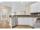 Kitchen featuring stainless steel appliances, granite countertops, and an open layout at 2400 Cumberland Se Pkwy # 212, Atlanta, GA 30339