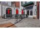 Outdoor patio seating at a restaurant with a charming exterior and inviting atmosphere at 2400 Cumberland Se Pkwy # 212, Atlanta, GA 30339