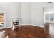 Bright living room featuring a fireplace and access to other rooms at 3430 Kensington Parc Cir, Avondale Estates, GA 30002